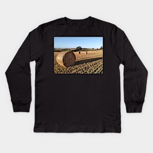 Round bales in evening light Kids Long Sleeve T-Shirt